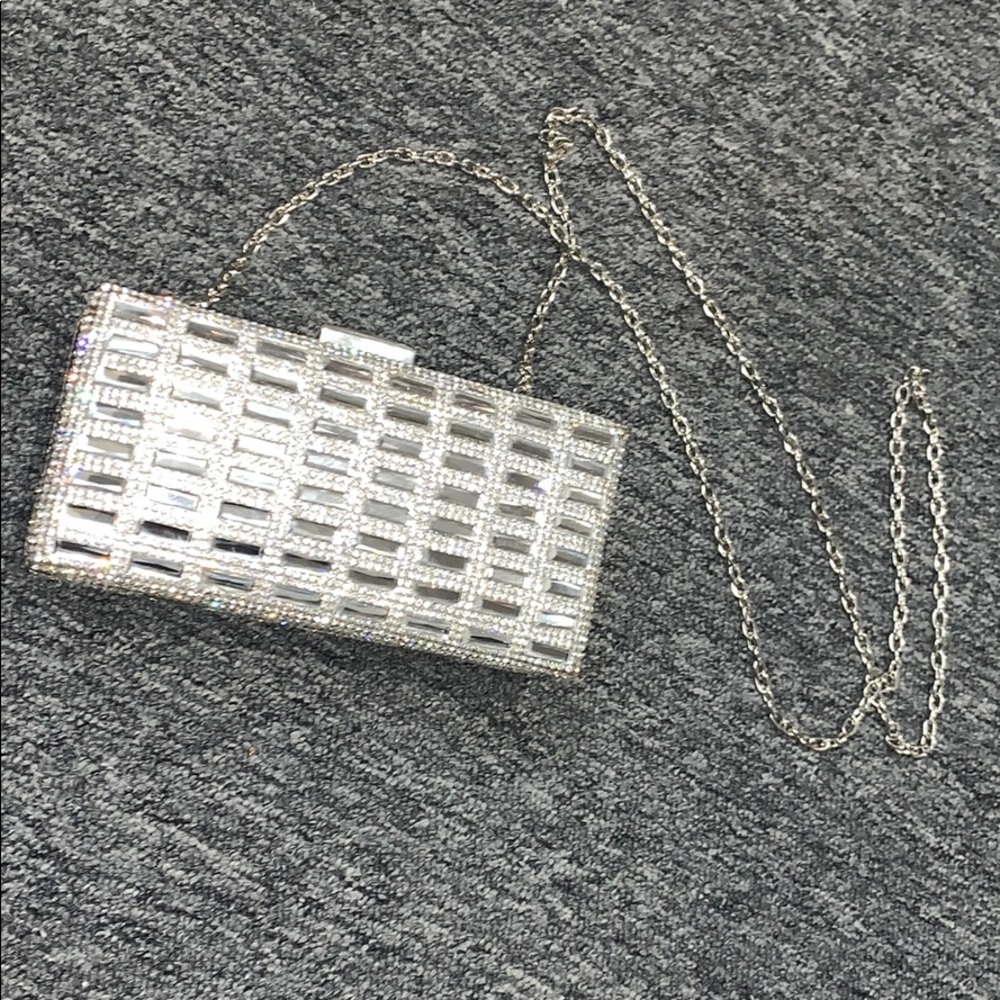 RSVP silver cross body clutch